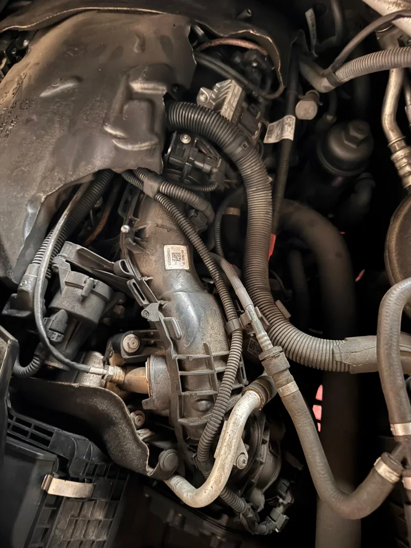 BMW N47 intake manifold installed in the engine bay