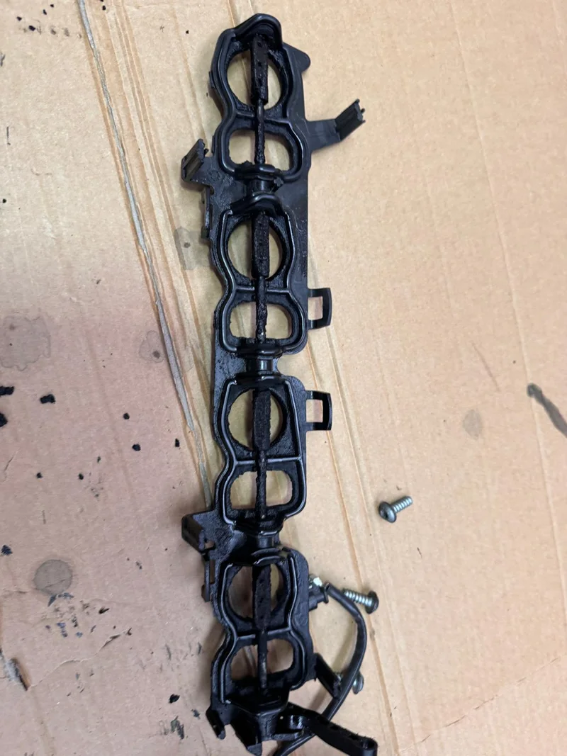 Removed intake swirl flap assembly