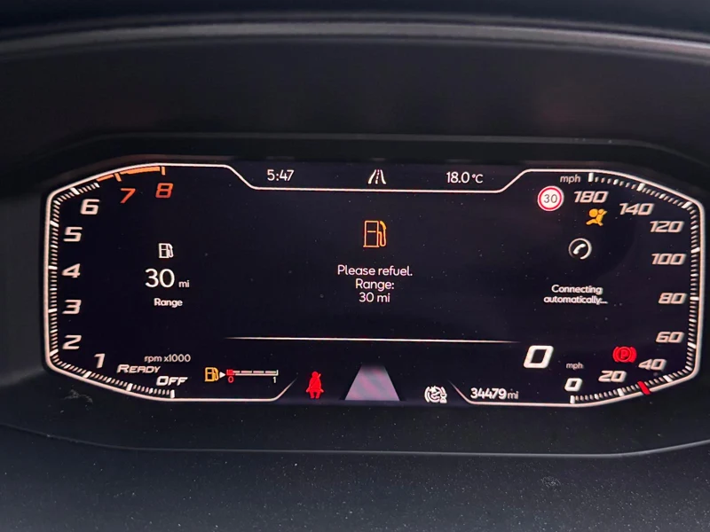Earlier dashboard view: amber airbag warning visible