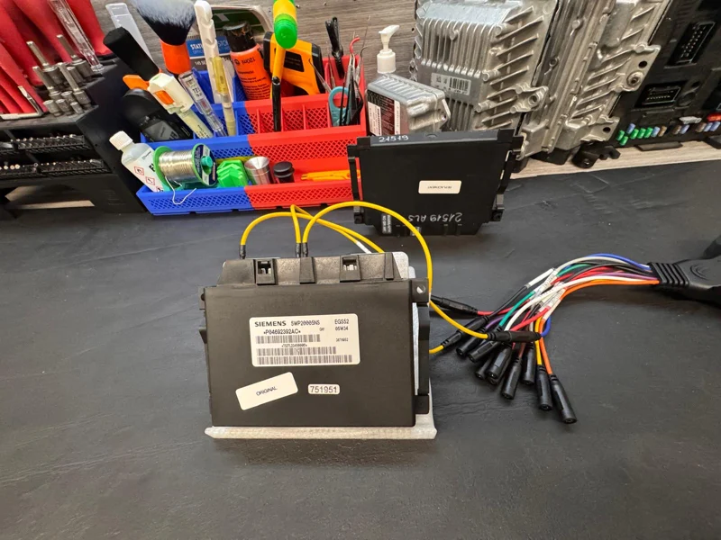 Original Siemens EGS52 TCM with replacement module on the SGTM bench