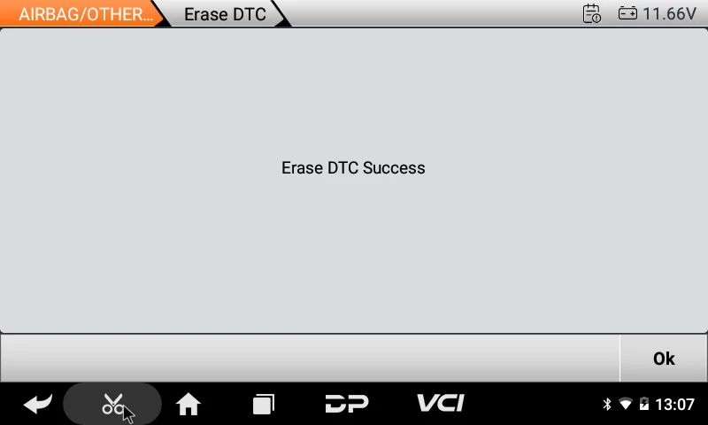 Diagnostic tool showing Erase DTC Success message
