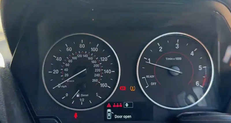 BMW 1 Series dashboard with ABS and DSC warning lights cleared after module coding