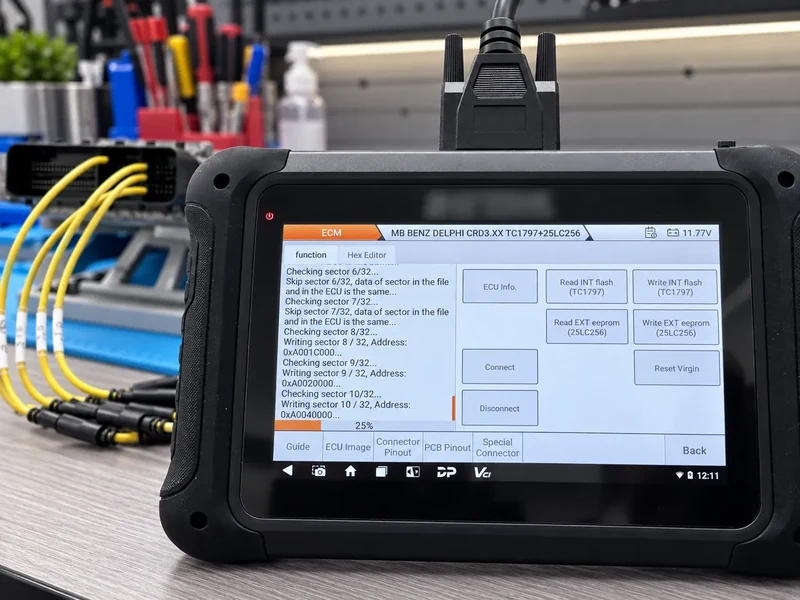 Side-angle view of Mercedes Delphi CRD3.xx ECU programming tablet and workbench setup