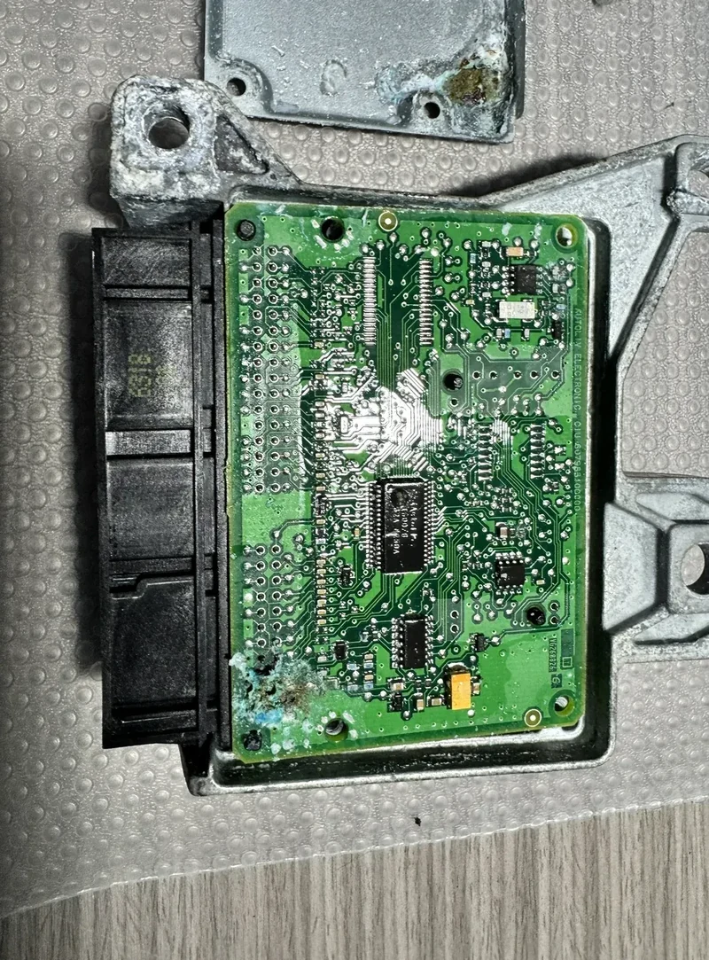 Opened BSI control board showing corrosion damage