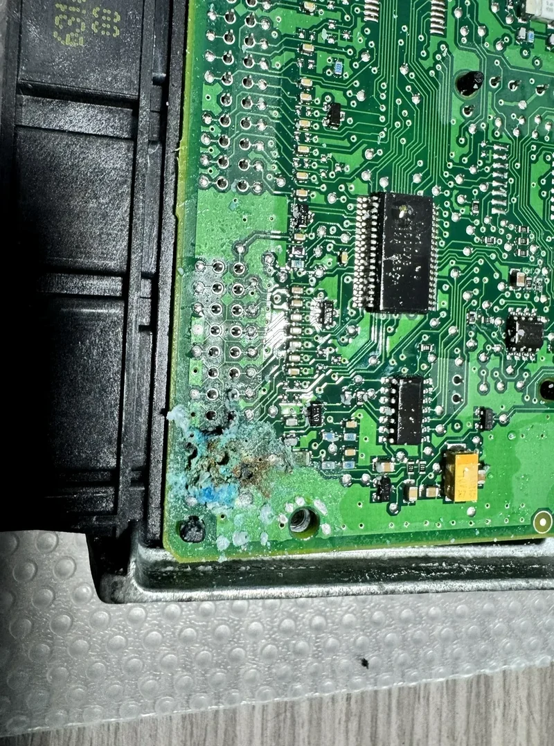 Close-up of corrosion on a Peugeot Partner BSI circuit board